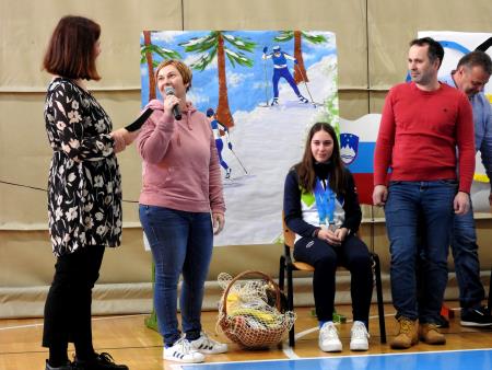 Tia Malovrh s staršema